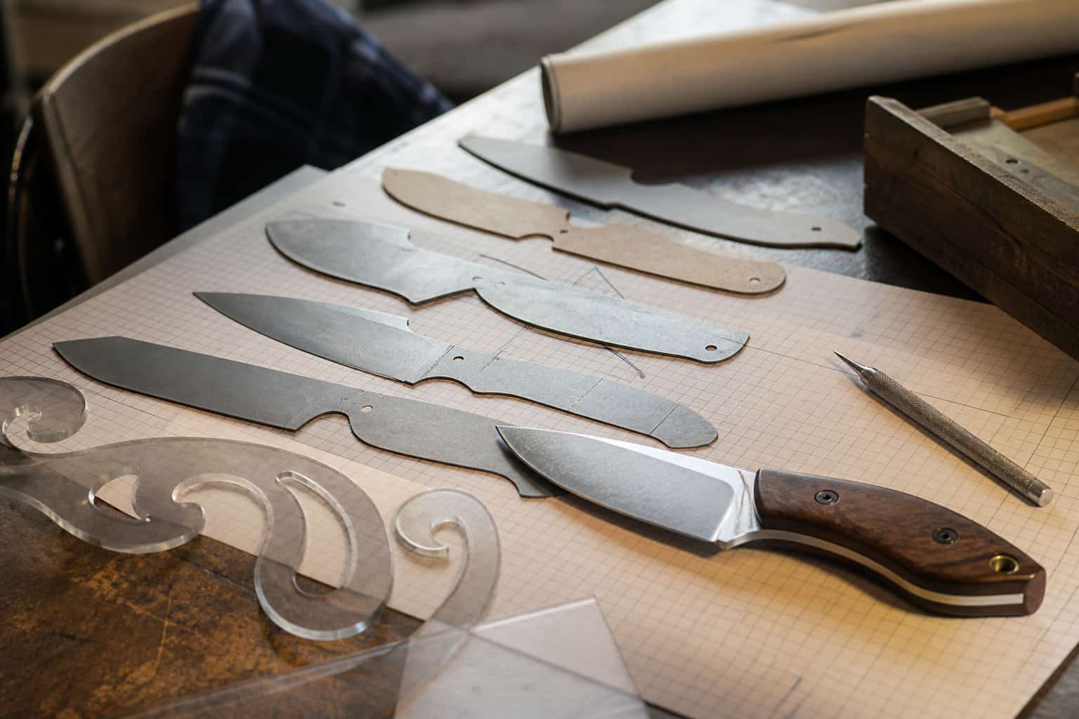 Knife blade design in a working knife shop