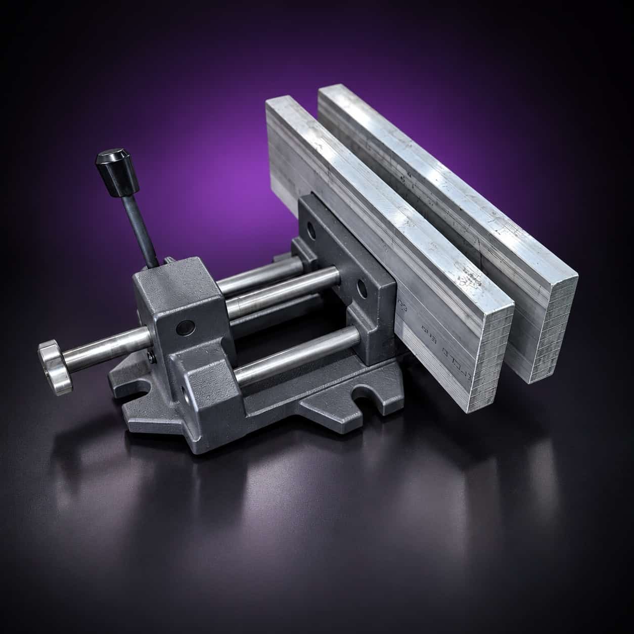 Cast-iron machine vise fitted with two long aluminum quench plates and a black knob handle, on black with a purple glow