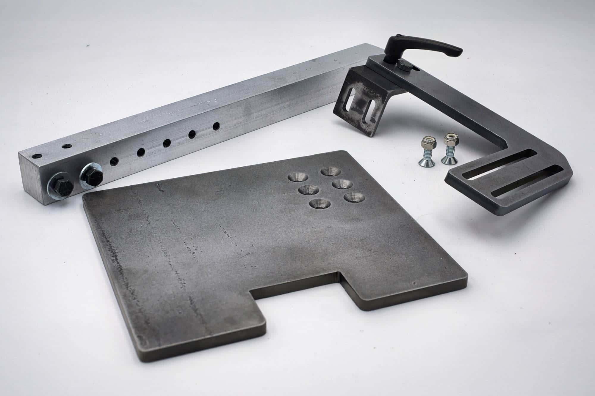 Aluminum work rest plate with counterbored mounting holes and an adjustable locking knob