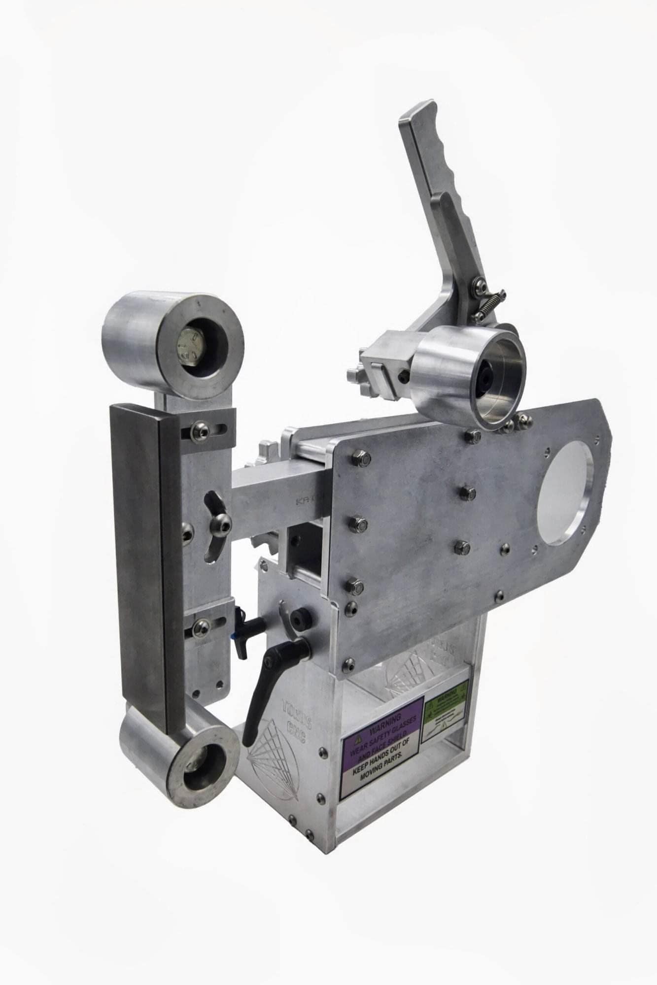 Tall vertical view of a Torus CNC tooling arm with tracking wheel, quick-release pin, and engraved base