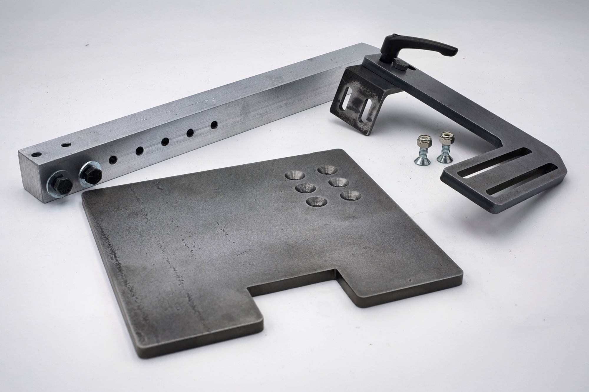 Aluminum work rest plate with counterbored mounting holes and an adjustable locking knob