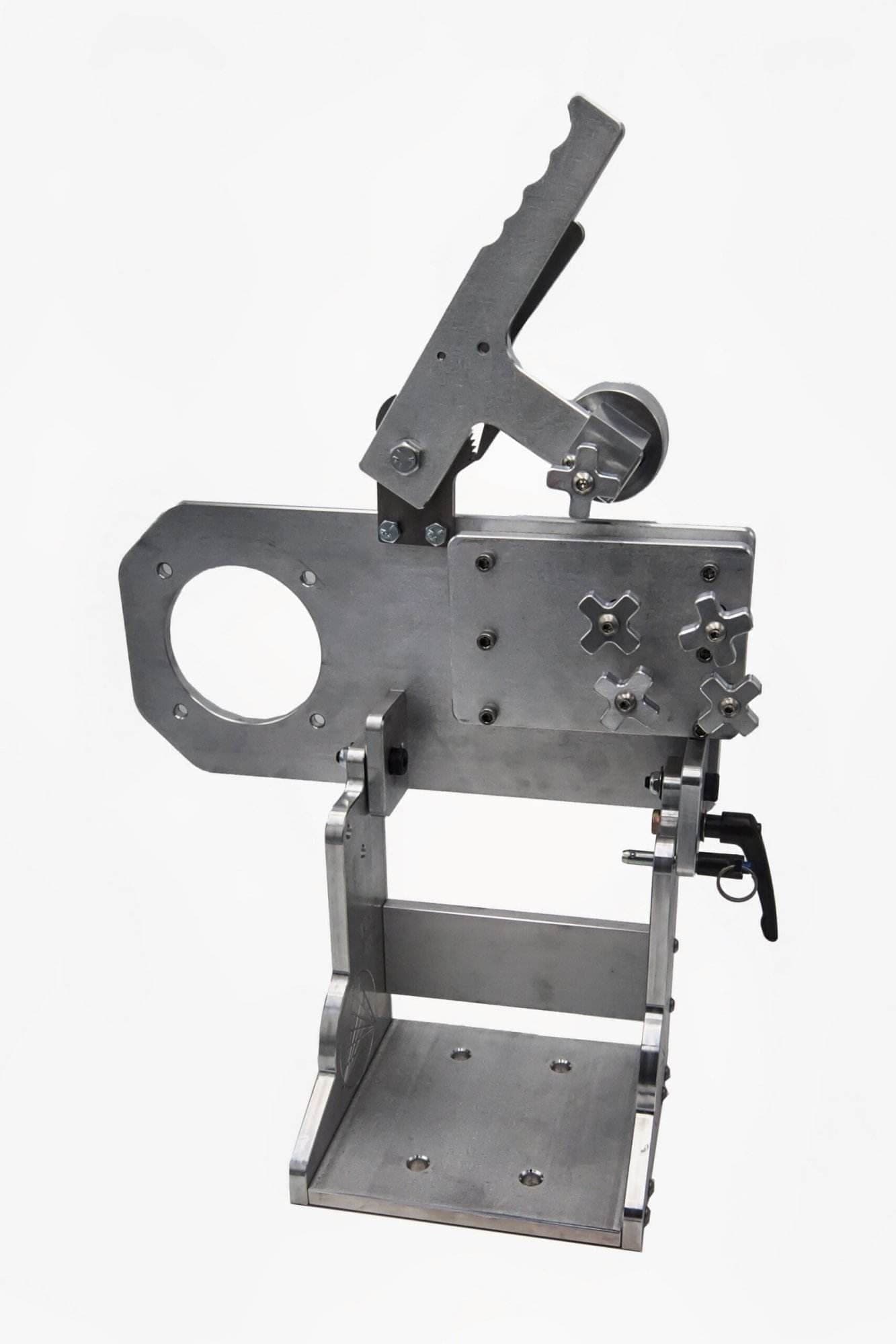 Aluminum grinder tool arm assembly with safety warning labels affixed to the mounting base