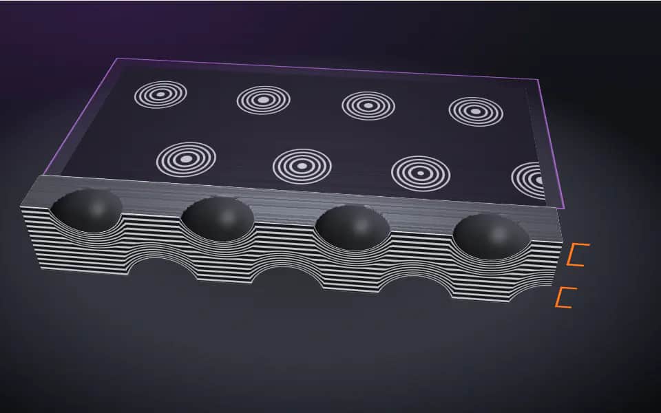 3D figure: a layered damascus bar dimpled with round divots, its top face ground to show them as concentric raindrop rings