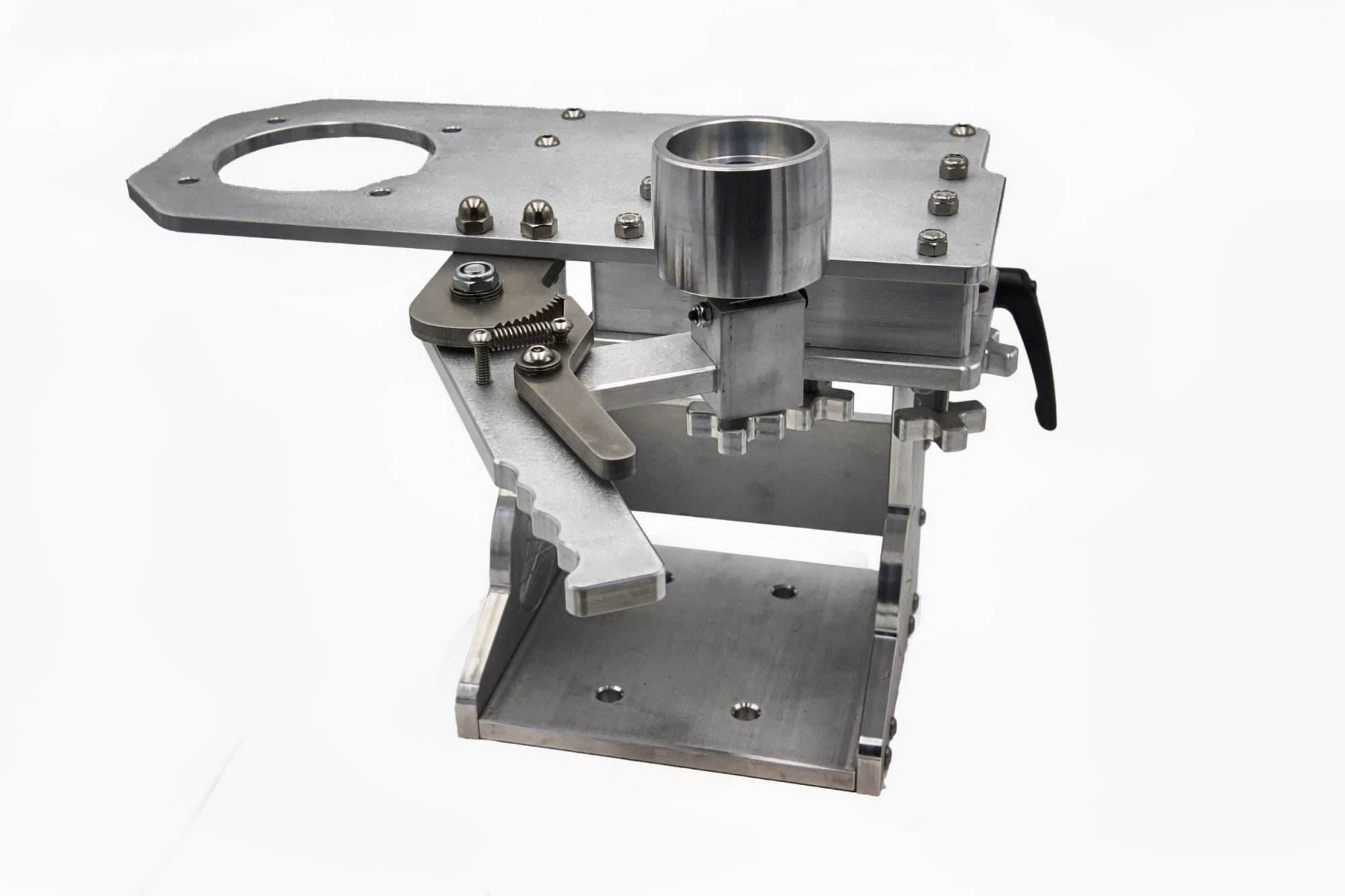 CNC aluminum grinder tool arm assembly viewed from a low angle showing the engraved mounting base