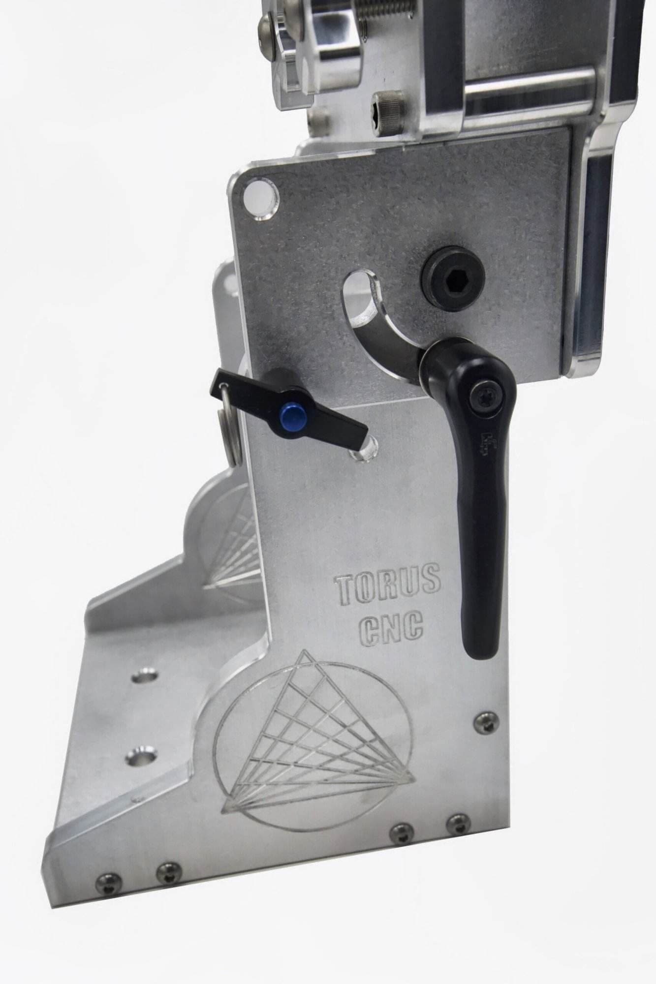 Black locking lever detail on a Torus CNC grinder arm base engraved with the company logo