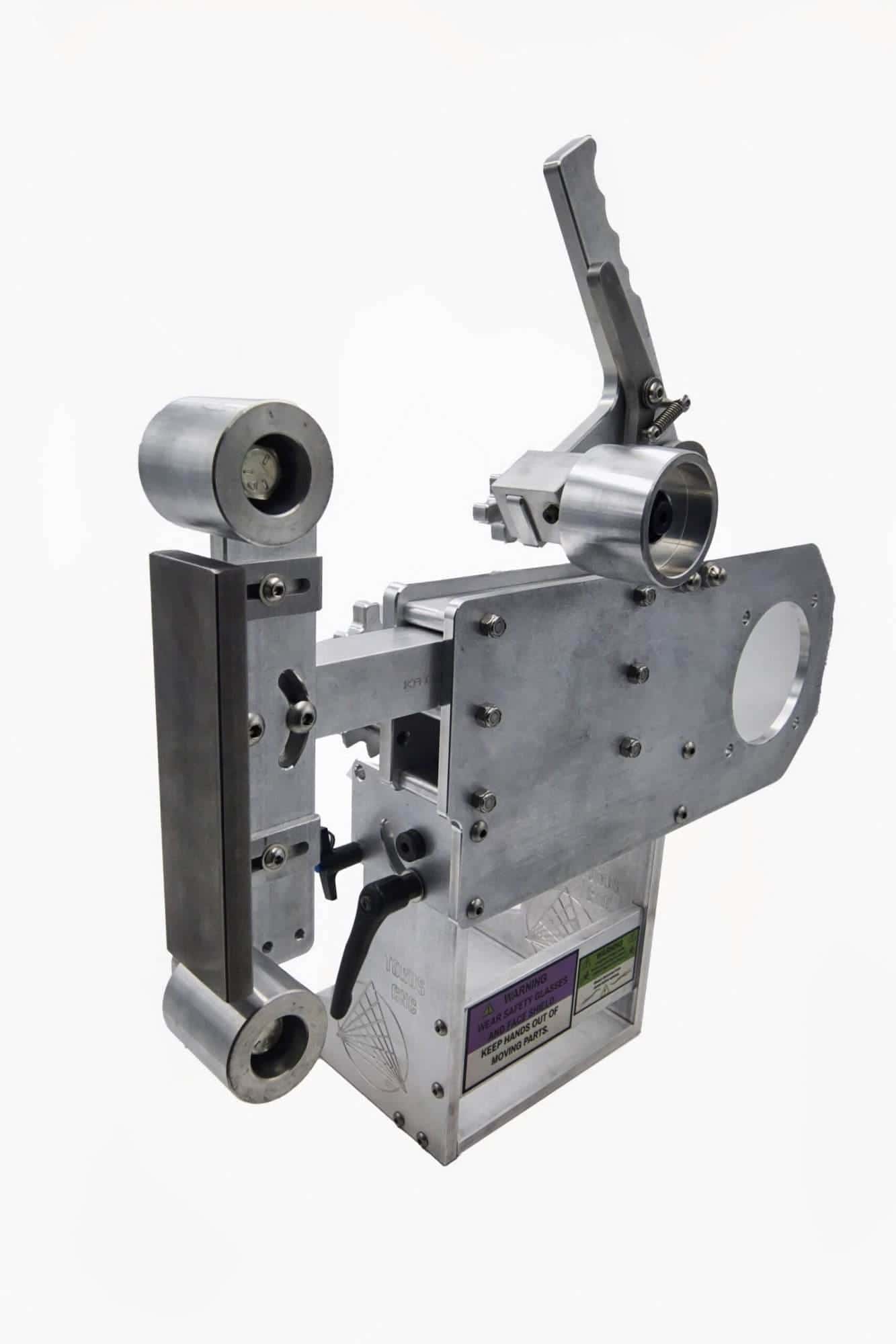Tall vertical view of a Torus CNC tooling arm with tracking wheel, quick-release pin, and engraved base