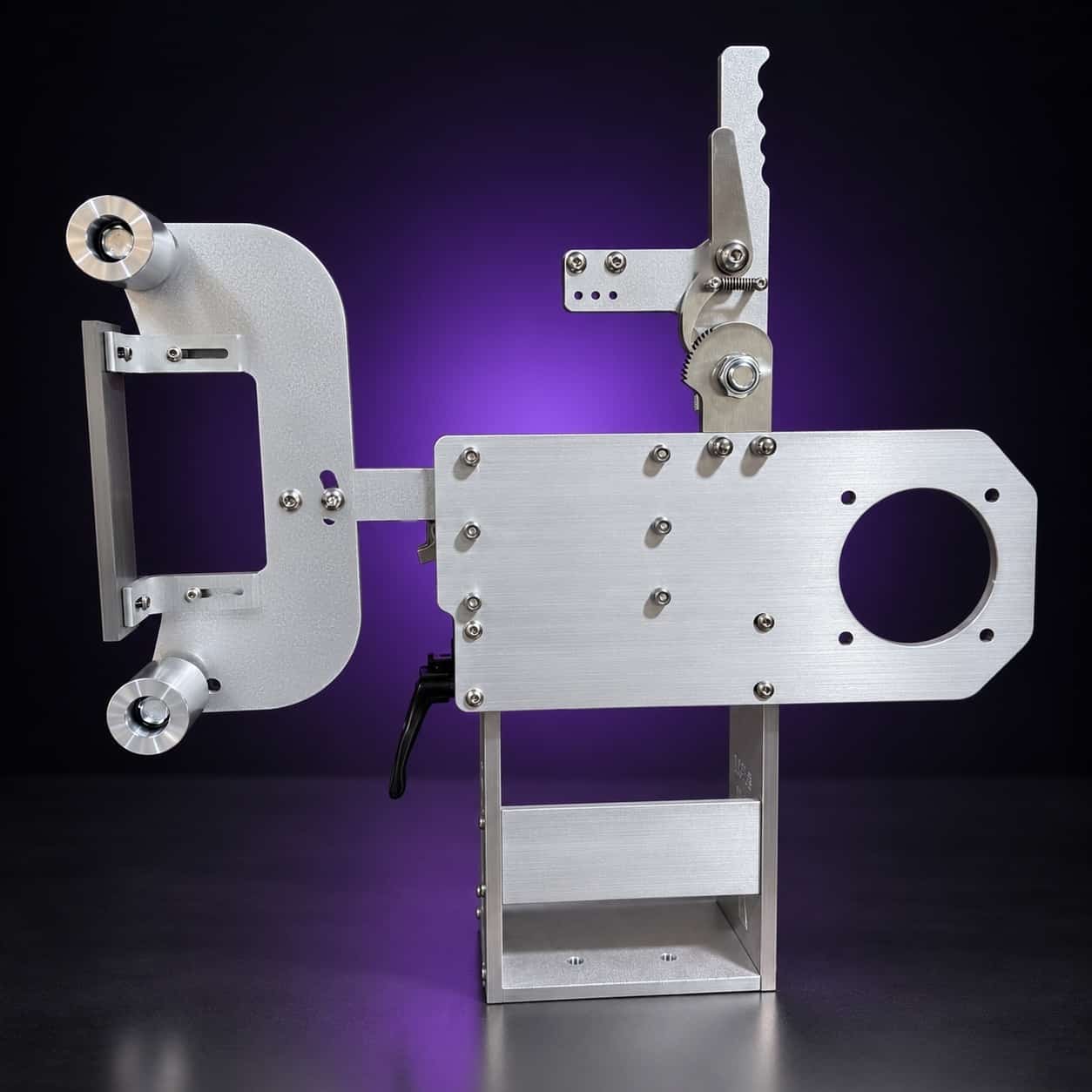 Classic aluminum 2x72 grinder, straight side view: D-shaped platen arm left, motor plate right, on black with a purple glow
